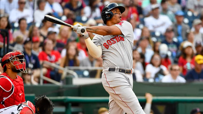 Oct 2, 2021; Washington, District of Columbia, USA; Boston Red Sox third baseman Rafael Devers (11) hits a solo home run against the Washington Nationals during the fourth inning at Nationals Park. Mandatory Credit: Brad Mills-USA TODAY Sports