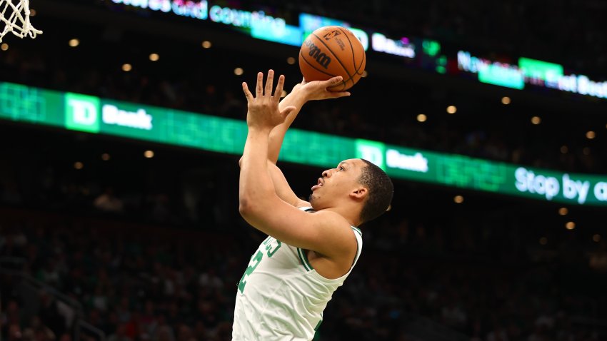 BOSTON, MASSACHUSETTS – MAY 15: Grant Williams #12 of the Boston Celtics shoots the ball during the first half in Game Seven of the 2022 NBA Playoffs Eastern Conference Semifinals against the Milwaukee Bucks at TD Garden on May 15, 2022 in Boston, Massachusetts. NOTE TO USER: User expressly acknowledges and agrees that, by downloading and/or using this photograph, User is consenting to the terms and conditions of the Getty Images License Agreement. (Photo by Adam Glanzman/Getty Images)