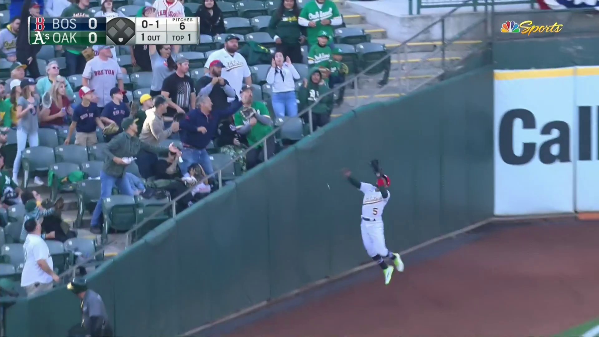 Tony Kemp makes a fantastic leaping grab at the left-field wall 