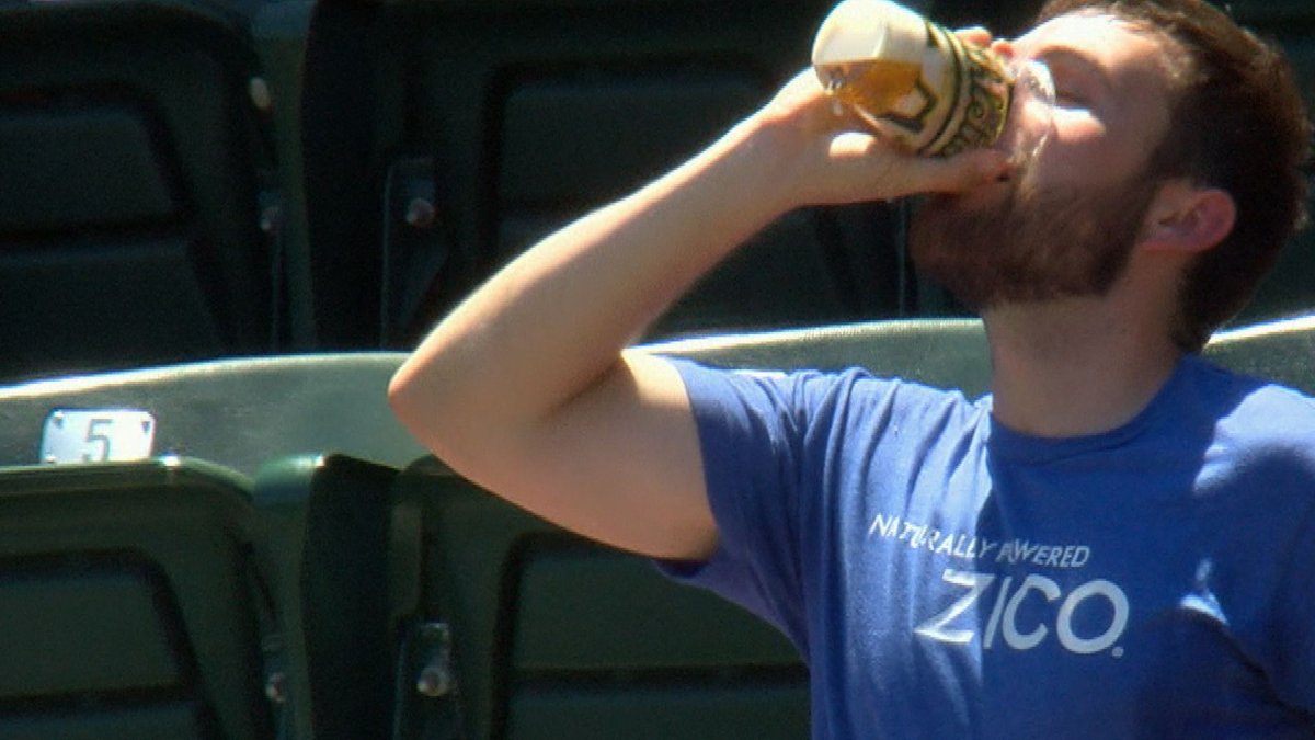 Beer with twist of cowhide Fan chugs drink with ball in it NBC