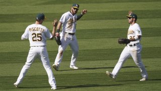 A's clinch first AL West title since 2013 after Astros lose to