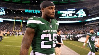 New York Jets running back Le’Veon Bell (26) walks off the field after being shut out by the New England Patriots, 33-0, at MetLife Stadium on Monday, Oct. 21, 2019, in East Rutherford. Nyj Vs Ne Week 7