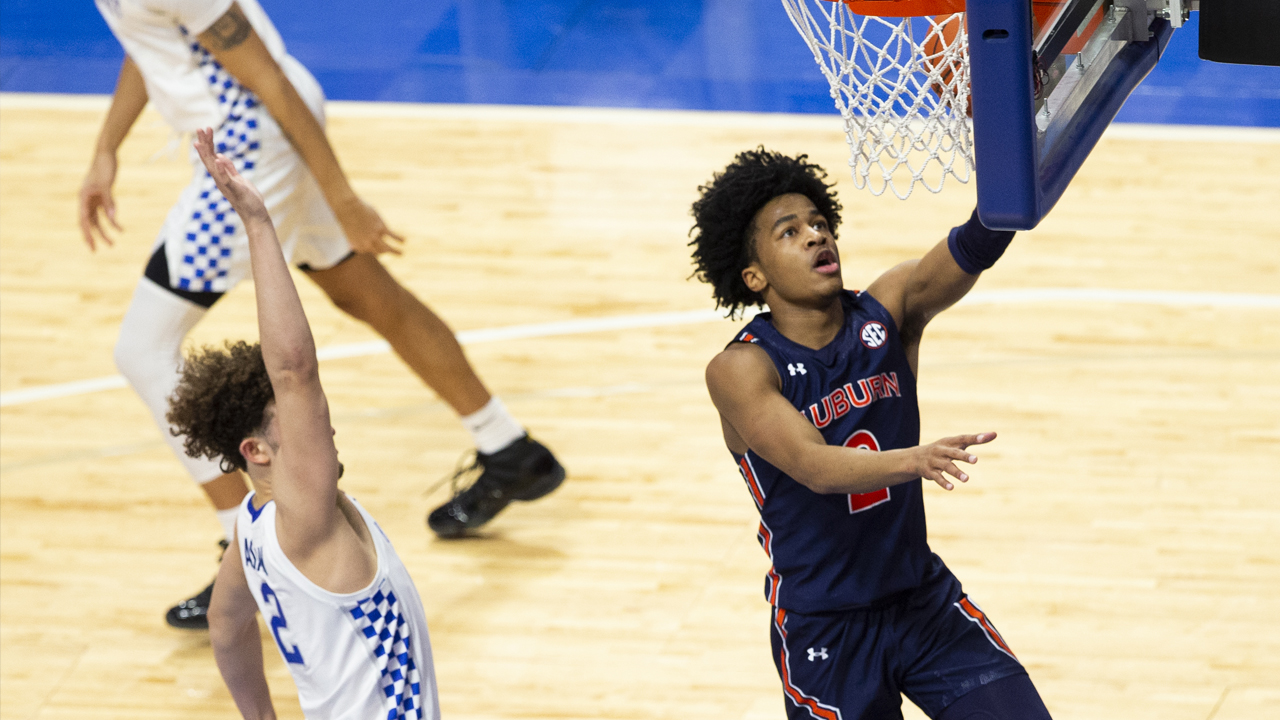 <p><strong>Measurables:</strong> 6-foot-1, 180 pounds<br />
<strong>Age:</strong> 19</p>
<p><strong>Team Needs:</strong></p>
<p>The Thunder need a lot of everything. They should be able to fill a major void with their top pick, but they need to find value here as well. They have some young pieces, but nothing that would limit them from choosing the best player available here in the mid-first.</p>
<p><strong>Why Cooper?</strong></p>
<p>Cooper is a flashy point guard who loves to create for himself and others off the dribble. He’s dangerous with the ball in his hands and averaged nearly nine assists per game in his freshman season at Auburn. He’s a work in progress when it comes to perimeter shooting and he turns the ball over at a high clip, but he's a highlight-reel waiting to happen. </p>
<p>The Thunder have multiple picks this year and a truckload of them in the coming drafts. They can gamble a little bit here and hope they find another diamond in the rough. Cooper is fun and can be a difference-maker off the bench early in his career and possibly more down the road.</p>
