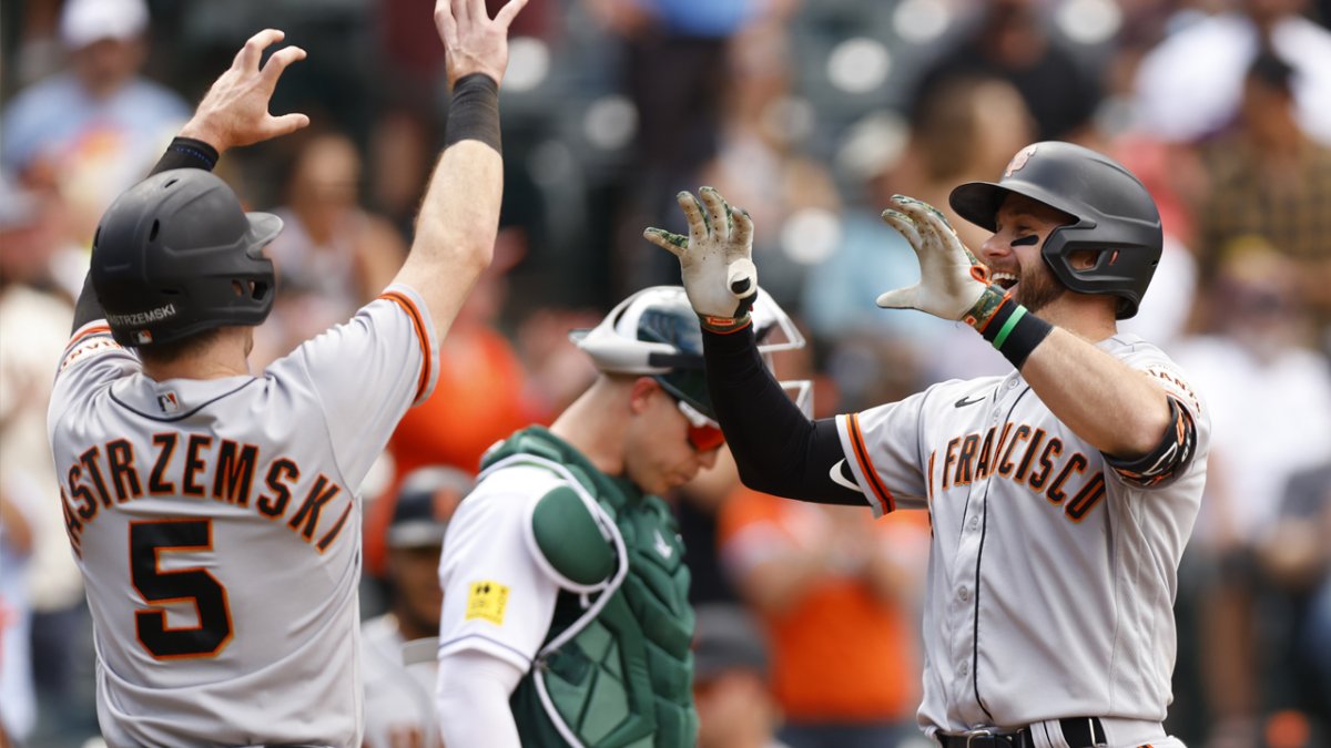 Evan Longoria of the San Francisco Giants hits a base loaded two-run