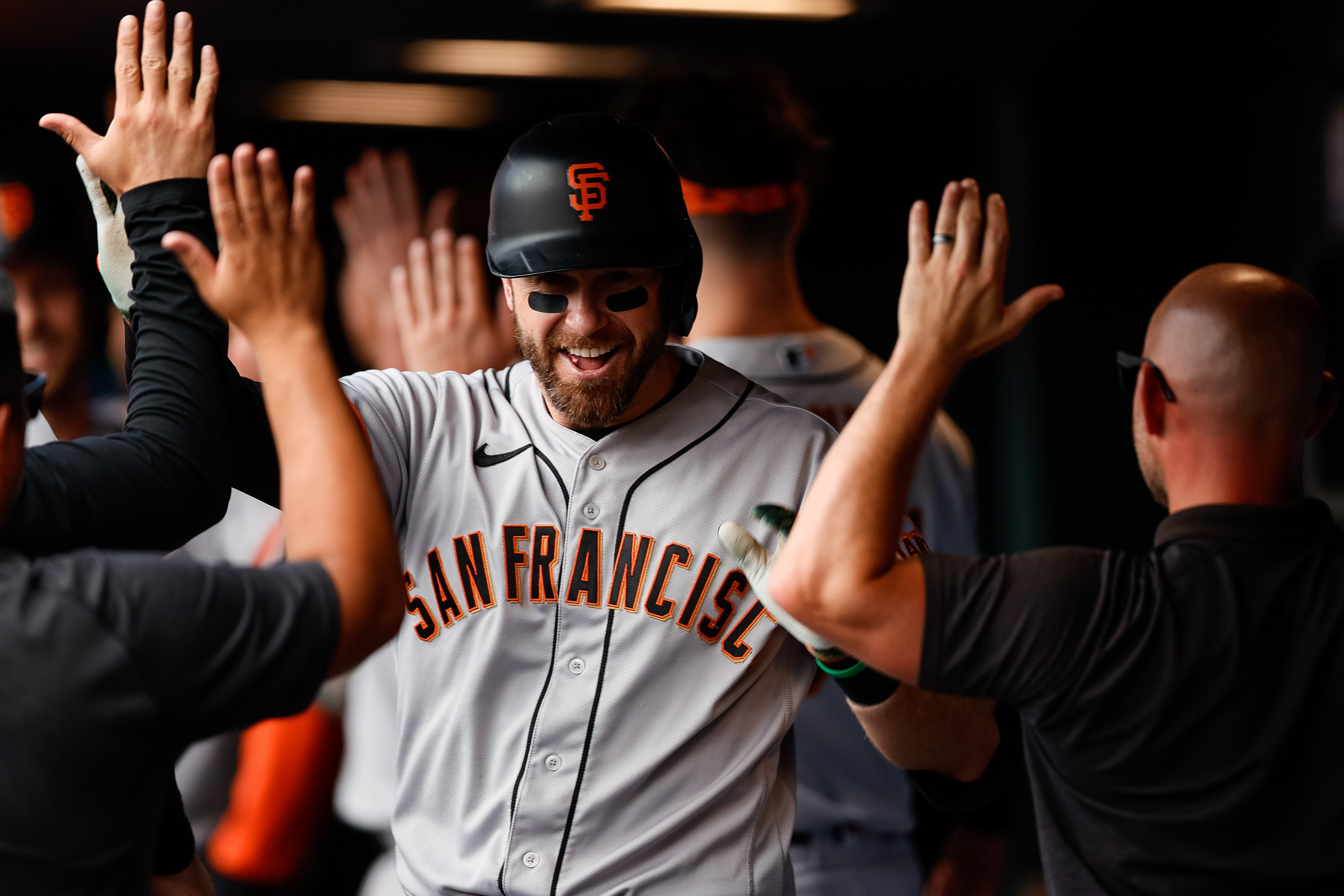 Evan Longoria carries Giants at plate, in field to extras win over