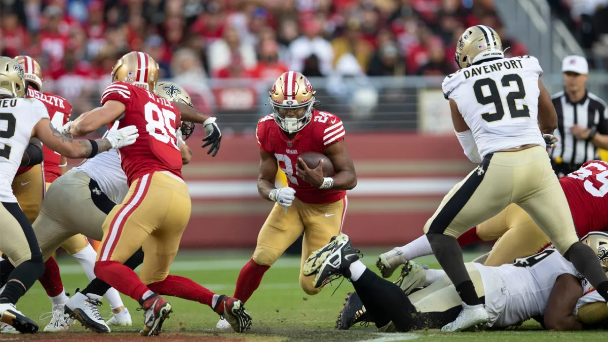 Jordan Mason of the San Francisco 49ers runs the ball during the News  Photo - Getty Images