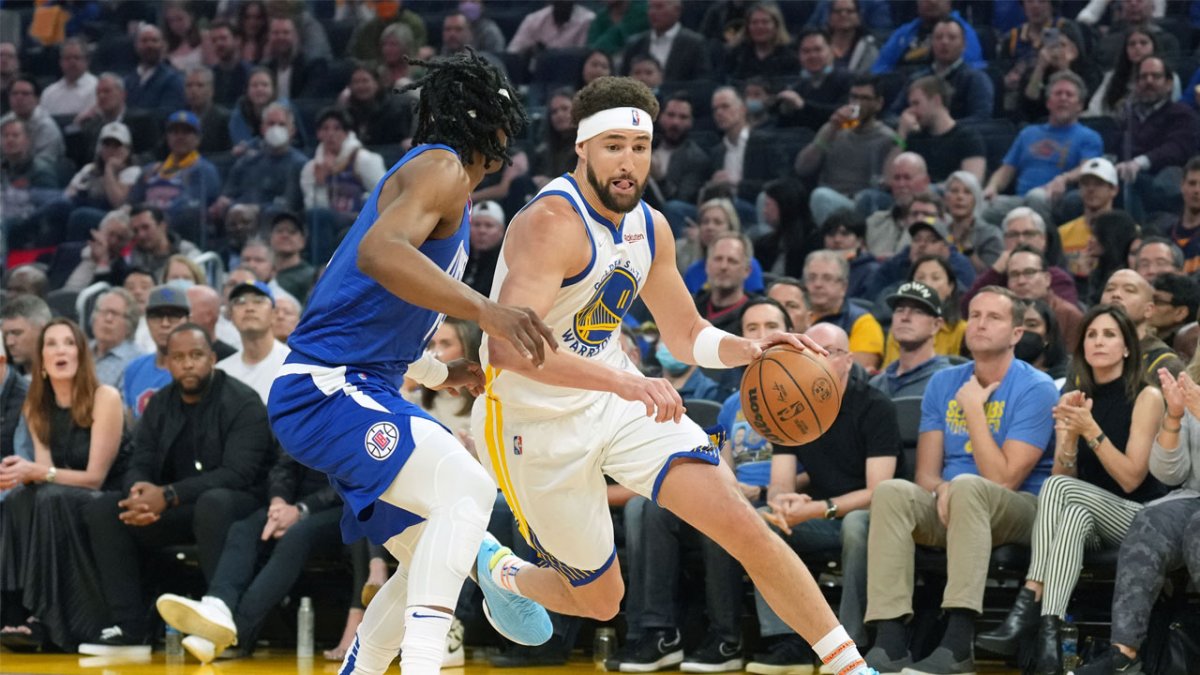 Jackie Moon appears with Warriors for pregame warmups