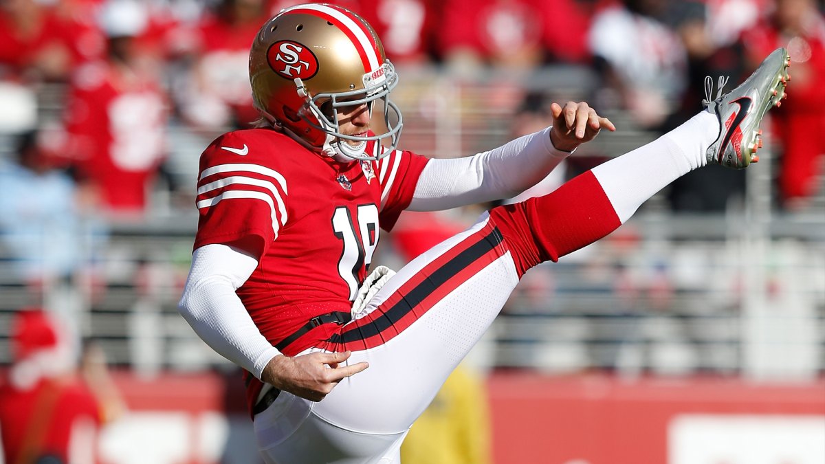 San Francisco 49ers punter Mitch Wishnowsky (18) runs after a