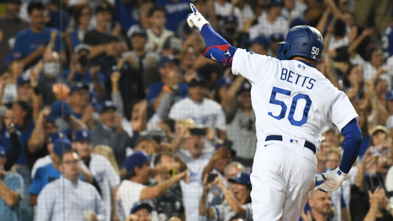 Dodgers fan interferes with Mookie Betts double, immediately bolts