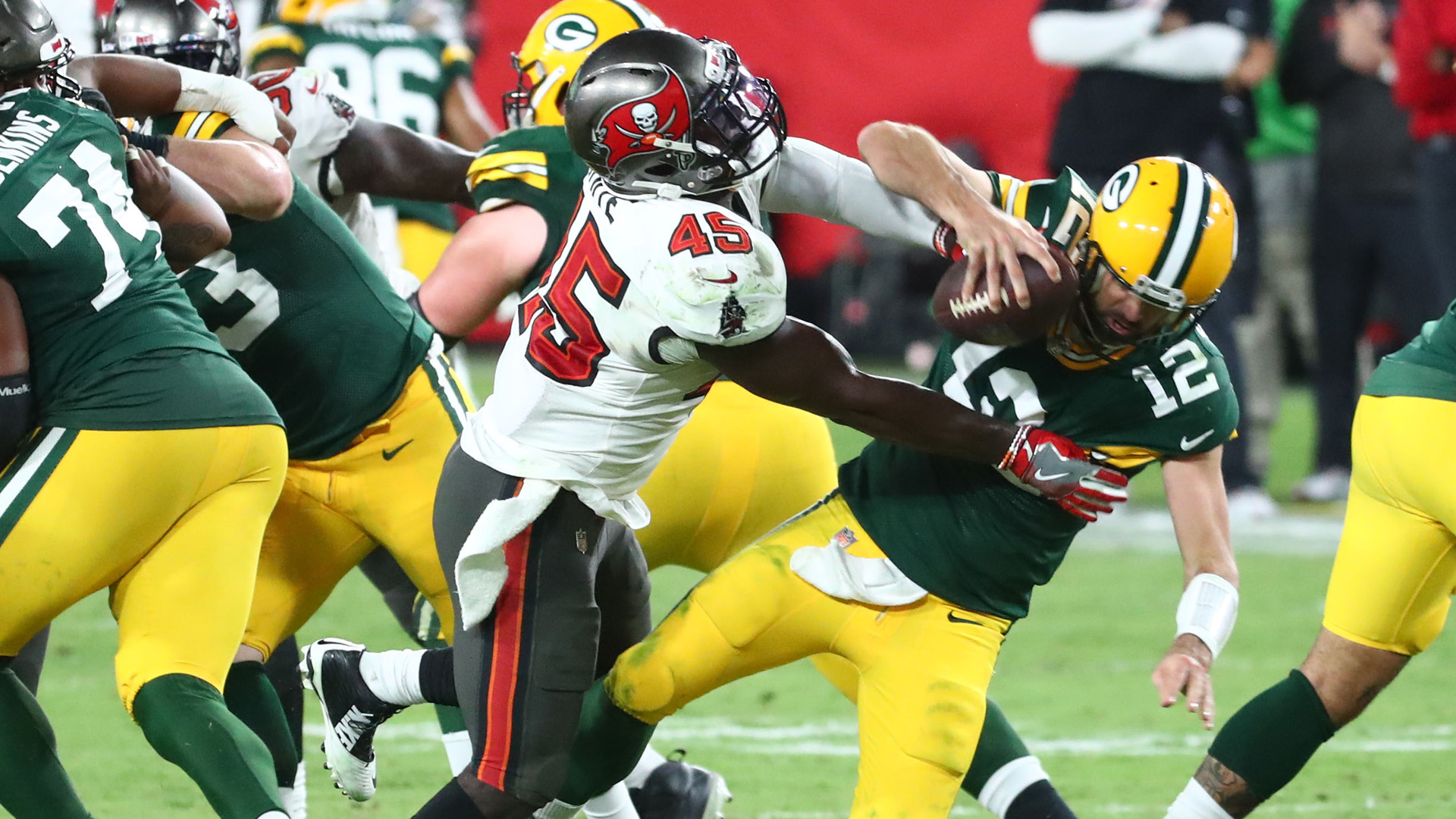 <p>What a difference three quarters can make.</p>
<p>After the first quarter Sunday at Raymond James Stadium, it looked like we were well on our way to an Aaron Rodgers special, with the Packers announcing themselves as the NFC's best team while handily beating Tom Brady and the Buccaneers.</p>
<p>When the final horn had sounded, Rodgers and the Packers looked more like the 2019 version -- the one that constantly crumbled against more physical opponents -- than the one that swaggered into Tampa Bay at 4-0.</p>
<p>Rodgers was bad. His teammates weren't much better. Aaron Jones was shut down. Davante Adams was bottled up by Carlton Davis and the rest of the Packers' mediocre receiver corps made less noise than a church mouse.</p>
<p>Today was the first game you could point to and say the Packers whiffed when drafting a quarterback who could supplant Rodgers in three seasons and not a receiver who could help now.</p>
<p>The game can be summed up in two shots. The first was Rodgers, pelvic thrusting after he thought he scrambled in for a touchdown to put the Packers up 10-0. (They scored on the next play.) There he was, that bad man, the one who had torn apart the Packers' first four opponents while placing himself squarely in the MVP race.</p>
<p>The next shot came in the fourth quarter with Rodgers on the bench having been replaced by Tim Boyle to stop the Bucs from teeing off on him during garbage time.</p>
<p>"You don't ever want to lose like this," Rodgers said after the game. "I felt like we needed a little bit of a wake-up call at some point this season because things have been so good and there's been so much talk maybe outside the building about the ease with which we're moving the ball on offense and scoring. I think we needed kind of a kick in the ass a little bit. There's a little bit of wake-up to stop feeling ourselves so much and get back to the things that got us to this position."</p>
<p>The Packers showed up to Raymond James Stadium dressed to impress. But they flew back to Green Bay searching for answers after the Bucs exposed them as the same soft, front-running wannabe contenders they were last year.</p>