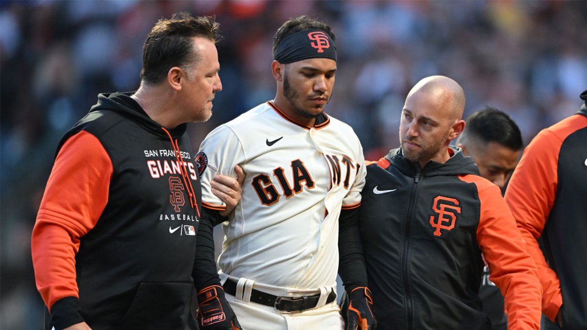 Isan Diaz of the San Francisco Giants looks on from the dugout