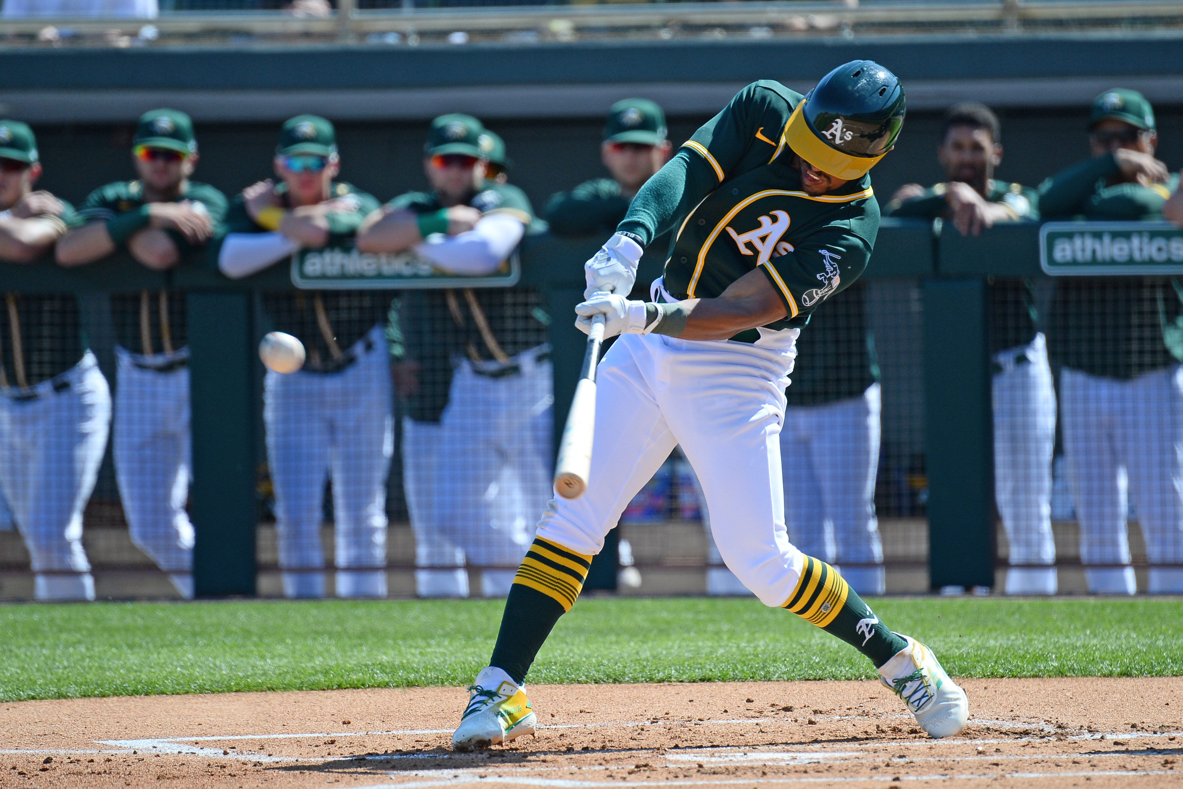 Mark Canha homered and flipped his bat