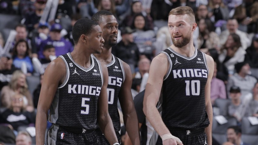 Domantas Sabonis, De'Aaron Fox, Harrison Barnes walking