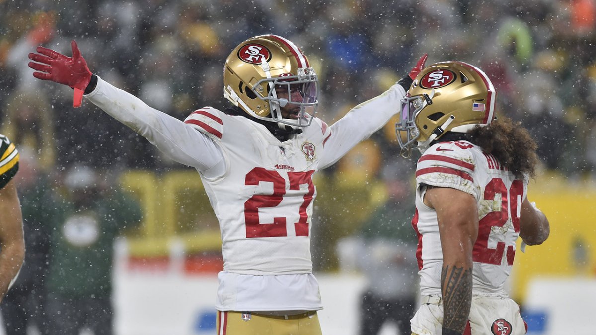 San Francisco 49ers' Talanoa Hufanga and Dontae Johnson break up a pass  intended for Green Bay …