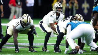 Aug 23, 2021; New Orleans, Louisiana, USA; New Orleans Saints quarterback Jameis Winston (2) waits for the snap against the Jacksonville Jaguars during the first half at Caesars Superdome. Mandatory Credit: Stephen Lew-USA TODAY Sports