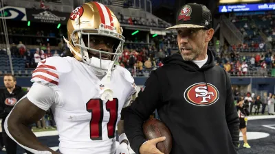 SEATTLE, WA – DECEMBER 15: Brandon Aiyuk #11 and Head Coach Kyle Shanahan of the San Francisco 49ers on the field before the game against the Seattle Seahawks at Lumen Field on December 15, 2022 in Seattle, Washington. The 49ers defeated the Seahawks 21-13. (Photo by Michael Zagaris/San Francisco 49ers/Getty Images)