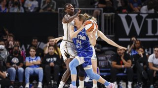 Jul 29, 2022; Chicago, Illinois, USA; New York Liberty forward Natasha Howard (6) defends against Chicago Sky guard Allie Quigley (14) during the second half of the WNBA game at Wintrust Arena. Mandatory Credit: Kamil Krzaczynski-USA TODAY Sports