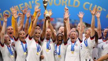 LYON, FRANCE - JULY 07: Carli Lloyd of the USA lifts the trophy as USA celebrate victory during the 2019 FIFA Women's World Cup France Final match between The United State of America and The Netherlands at Stade de Lyon on July 07, 2019 in Lyon, France. (Photo by Richard Heathcote/Getty Images)