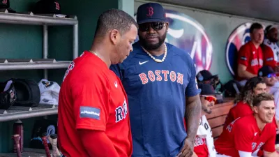 Red Sox third baseman Rafael Devers with David Ortiz