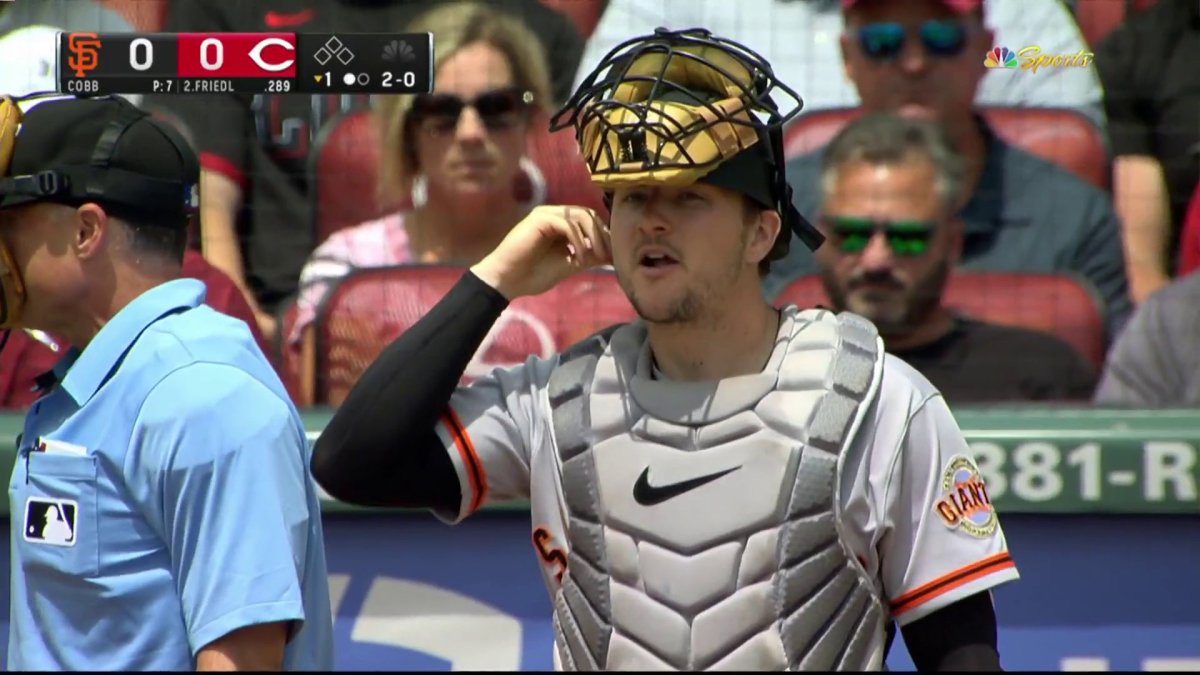 PHI@SF: Kid wears catcher's gear in the stands 