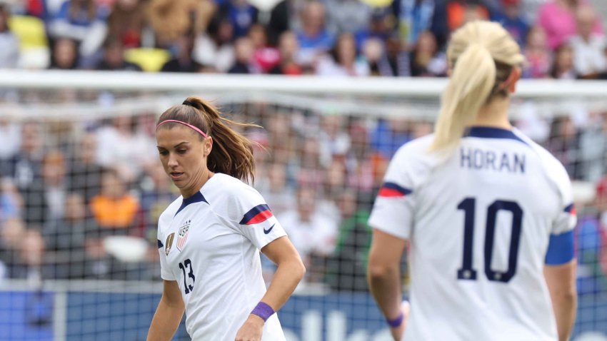 United States forward Alex Morgan (13) passes to United States midfielder Lindsey Horan (10) during the SheBelieves Cup match between USA and Japan, February 19, 2023 at GEODIS Park in Nashville, Tennessee.