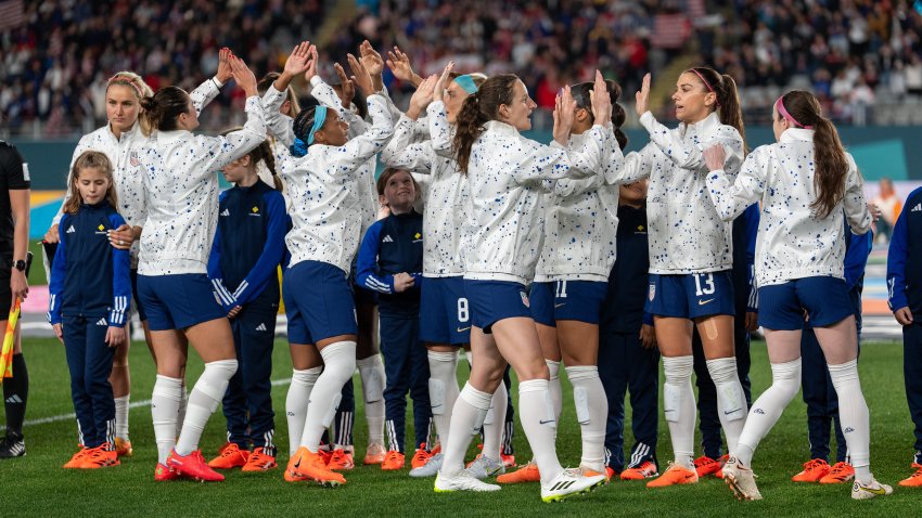 AUCKLAND, NEW ZEALAND – AUGUST 1: Andi Sullivan #17 of the United States high fives Alex Morgan #13before a FIFA World Cup Group Stage game between Portugal and USA at Eden Park on August 1, 2023 in Auckland, New Zealand.