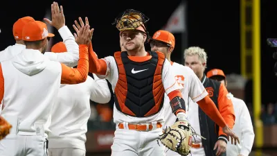 SAN FRANCISCO, CALIFORNIA – AUGUST 01: Catcher Patrick Bailey #14 of the San Francisco Giants celebrates with teammates after a win against the Arizona Diamondbacks at Oracle Park on August 01, 2023 in San Francisco, California. (Photo by Lachlan Cunningham/Getty Images)