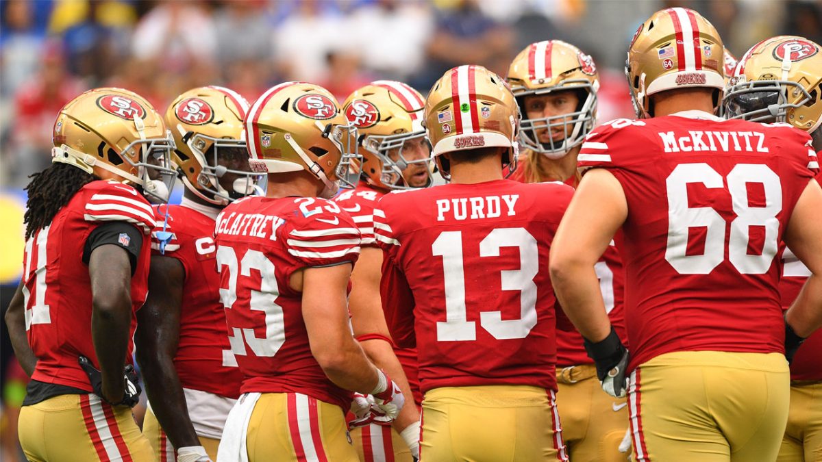 John Taylor runs with the ball for the San Francisco 49ers in Super News  Photo - Getty Images