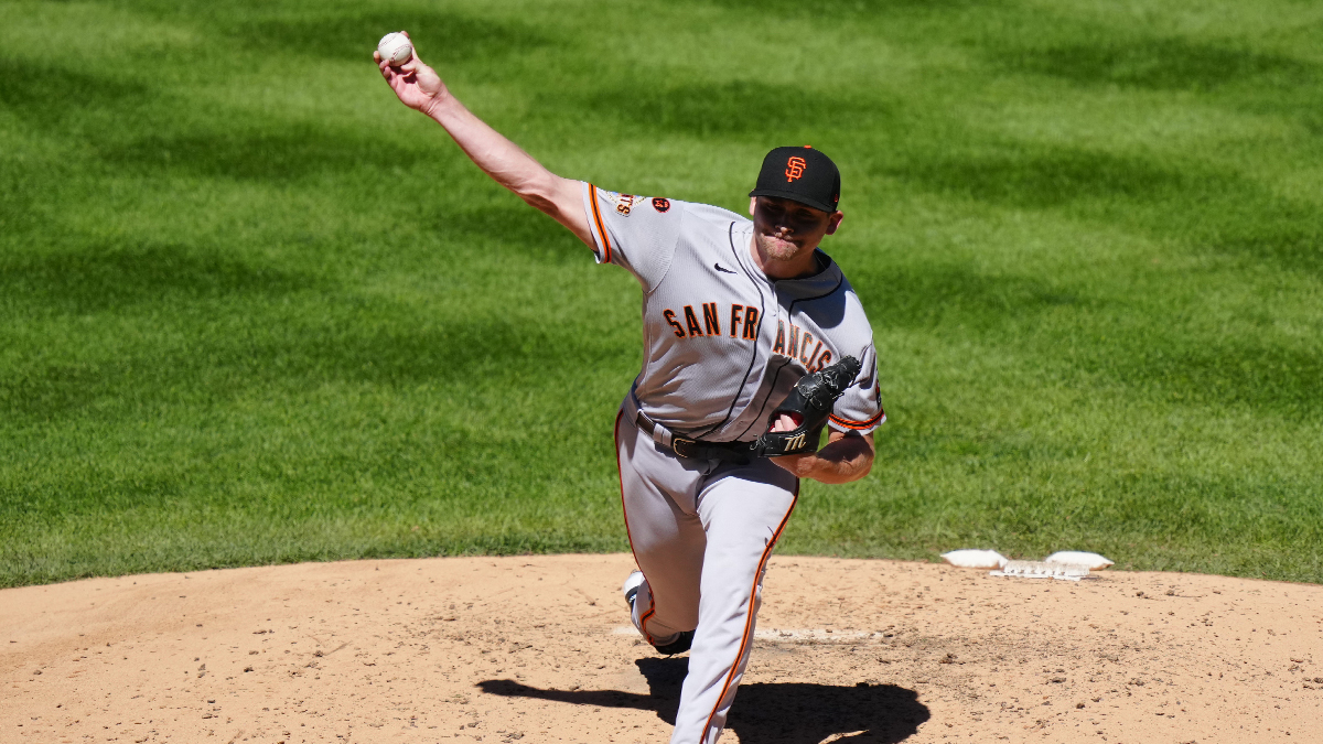 Giants split doubleheader with Rockies