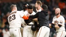 Giants rally past Guardians 5-4 in 10 innings to keep pace in NL