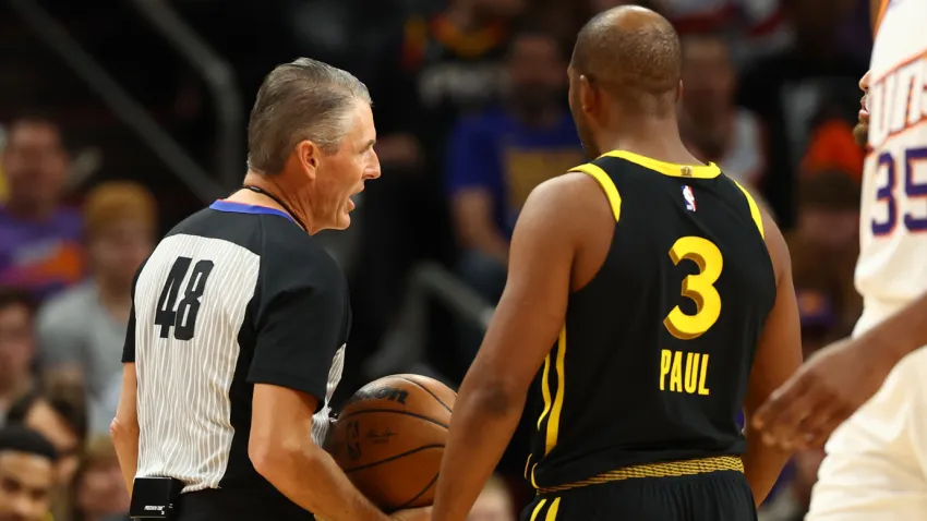 Nov 22, 2023; Phoenix, Arizona, USA; Golden State Warriors guard Chris Paul (3) argues with NBA referee Scott Foster after getting a technical foul against the Phoenix Suns in the first half at Footprint Center. Mandatory Credit: Mark J. Rebilas-USA TODAY Sports