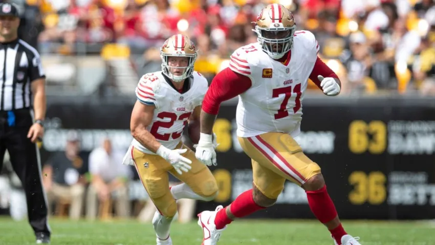 PITTSBURGH, PA – September 10: Christian McCaffrey #23 of the San Francisco 49ers rushes as Trent Williams #71 blocks during the game against the Pittsburgh Steelers at Acrisure Stadium on September 10, 2023 in Pittsburgh, Pennsylvania. The 49ers defeated the Steelers 30-7. (Photo by Michael Zagaris/San Francisco 49ers/Getty Images)