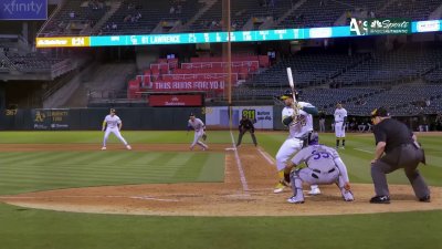 Brown's two-run homer ties A's-Rockies game in seventh inning