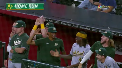 A's homer three times in ninth to secure win vs. D-backs