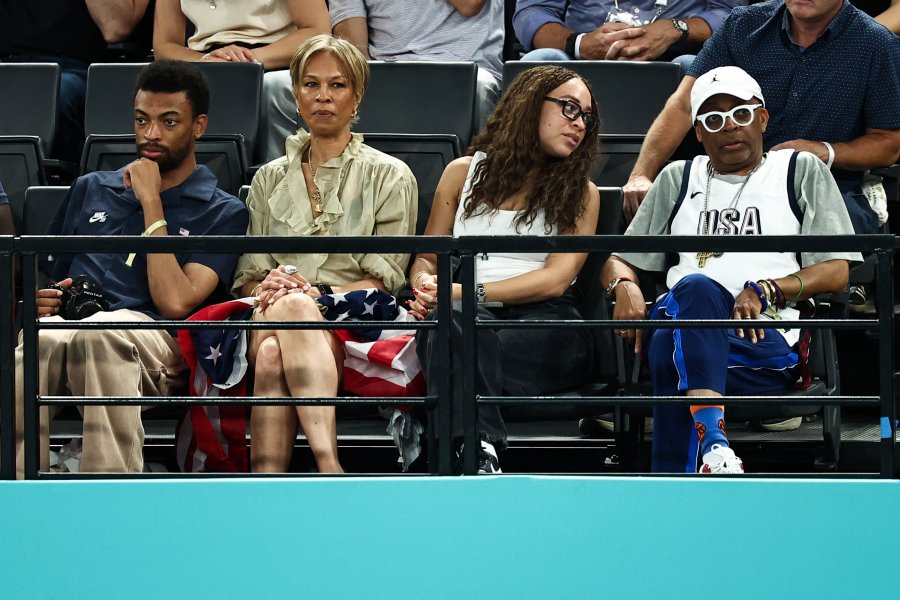 (From R) US film director Spike Lee and his daughter Satchel, his wife US producer Tonya Lewis and son Jackson attend the artistic gymnastics women's team final during the Paris 2024 Olympic Games at the Bercy Arena in Paris, on July 30, 2024.