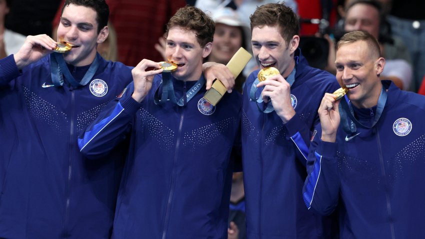 Gold Medalists, Jack Alexy, Chris Guiliano, Hunter Armstrong and Caeleb Dressel of Team USA pose with their medals