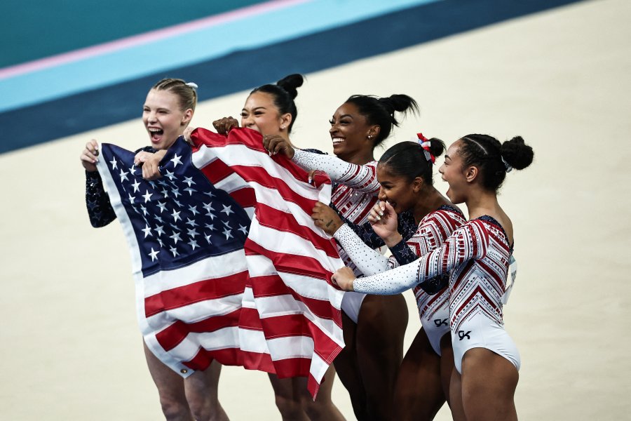 Biles and teammates Jade Carey, Suni Lee, Jordan Chiles and Hezly Rivera