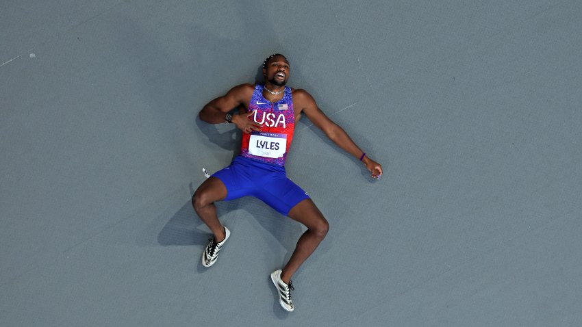 Noah Lyles recovers on the track after competing