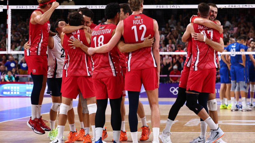 eam United States Athletes celebrate after winning a Men's Bronze Medal Match between Team Italy and Team United States on day fourteen of the Olympic Games Paris 2024 at Paris Arena on August 09, 2024 in Paris, France. (