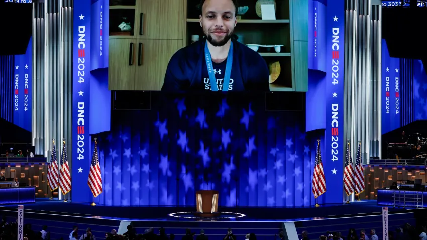 CHICAGO, ILLINOIS – AUGUST 22: NBA player Steph Curry delivers a video message during the final day of the Democratic National Convention at the United Center on August 22, 2024 in Chicago, Illinois. Delegates, politicians, and Democratic Party supporters are gathering in Chicago, as current Vice President Kamala Harris is named her party’s presidential nominee. The DNC takes place from August 19-22. (Photo by Chip Somodevilla/Getty Images)