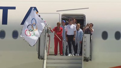 Olympic flag arrives in Los Angeles