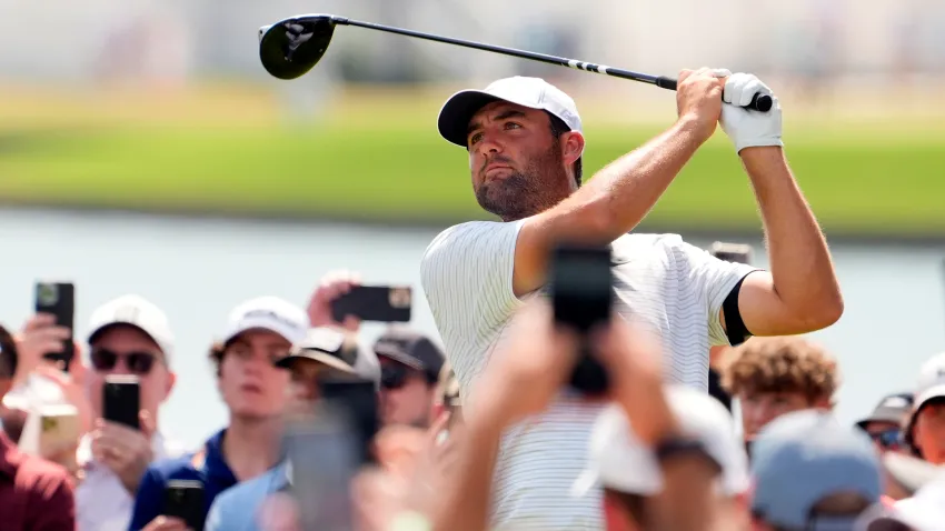 Aug 31, 2024; Atlanta, Georgia, USA; ; Scottie Scheffler plays his shot from the fourth tee box during the third round of the TOUR Championship golf tournament. (Mandatory Credit: John David Mercer-USA TODAY Sports)