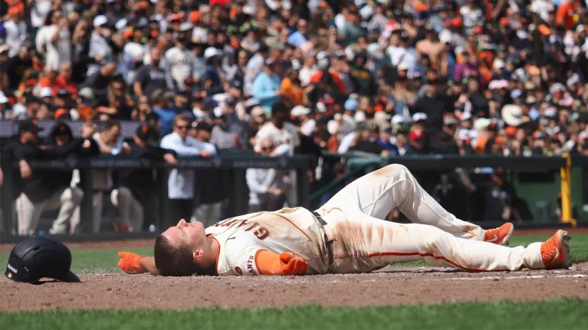 Matt Chapman laying on ground at home plate