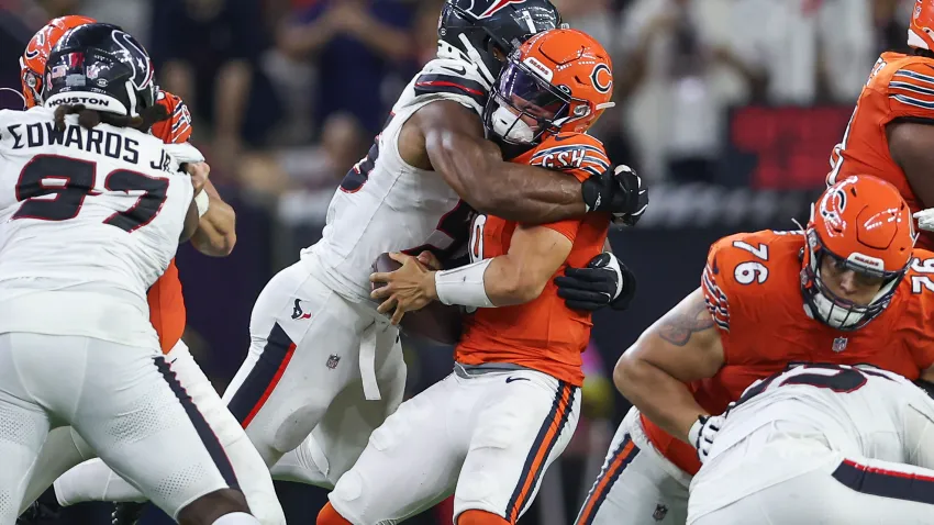 Sep 15, 2024; Houston, Texas, USA; Houston Texans defensive end Danielle Hunter (55) tackles Chicago Bears quarterback Caleb Williams (18) during the fourth quarter at NRG Stadium. Mandatory Credit: Troy Taormina-Imagn Images