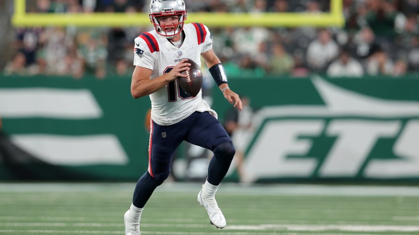 Sep 19, 2024; East Rutherford, New Jersey, USA; New England Patriots quarterback Drake Maye (10) runs with the ball against the New York Jets during the fourth quarter at MetLife Stadium. Mandatory Credit: Brad Penner-Imagn Images