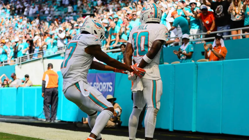 Miami Dolphins wide receiver Tyreek Hill (10) celebrates with wide receiver Jaylen Waddle (17) after scoring a touchdown against the Jacksonville Jaguars during the third quarter at Hard Rock Stadium.