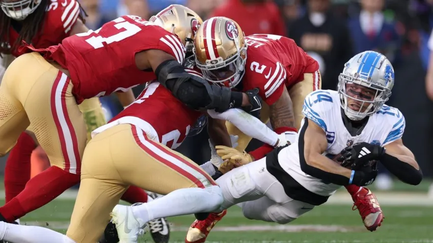 SANTA CLARA, CALIFORNIA – JANUARY 28: Amon-Ra St. Brown #14 of the Detroit Lions dives with the ball during the first half against the San Francisco 49ers in the NFC Championship Game at Levi’s Stadium on January 28, 2024 in Santa Clara, California. (Photo by Ezra Shaw/Getty Images)