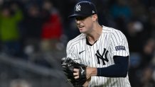 Sep 29, 2024; Bronx, New York, USA; New York Yankees pitcher Clay Holmes (35) reacts after the games final out against the Pittsburgh Pirates at Yankee Stadium. Mandatory Credit: John Jones-Imagn Images