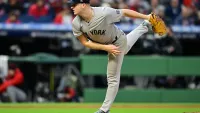 Oct 17, 2024; Cleveland, Ohio, USA; New York Yankees pitcher Clarke Schmidt (36) throws during the fifth inning against the Cleveland Guardians in game 3 of the American League Championship Series at Progressive Field. Mandatory Credit: David Dermer-Imagn Images