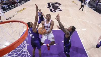 SACRAMENTO, CA – JANUARY 1:  Tyrese Maxey #0 of the Philadelphia 76ers drives to the basket during the game against the Sacramento Kings on January 1, 2025 at Golden 1 Center in Sacramento, California. NOTE TO USER: User expressly acknowledges and agrees that, by downloading and or using this Photograph, user is consenting to the terms and conditions of the Getty Images License Agreement. Mandatory Copyright Notice: Copyright 2025 NBAE (Photo by Rocky Widner/NBAE via Getty Images)